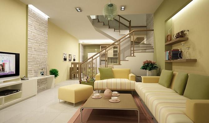 Cầu thang như vách ngăn chia đôi phòng khách và bếp